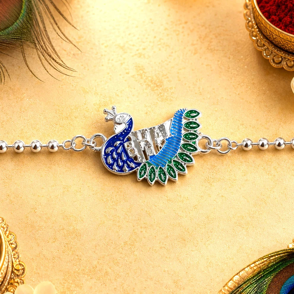 Rakshabandhan Silver Peacock Rakhi – Stylish & Traditional Design by madhavans