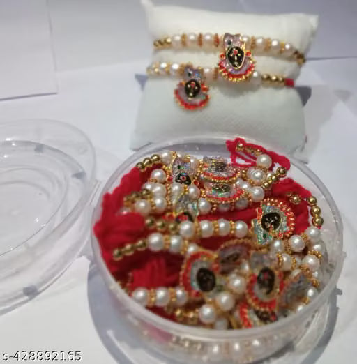 white pearl rakhi with shrinath ji brooch pack of 12 rakhi box packing rakhi for rakshabandhan