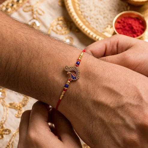 Peacock Rakhi – Elegant Traditional Design for Raksha Bandhan Festival By Madhavans
