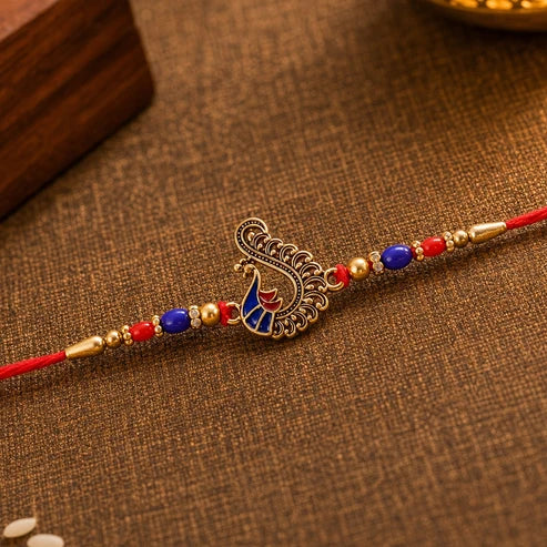 Peacock Rakhi – Elegant Traditional Design for Raksha Bandhan Festival By Madhavans